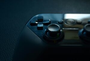 A sleek and modern game controller captured in close-up with dramatic lighting, perfect for gaming themes.