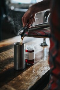 thermos, heater, coffee, tea, drink, vacuum flask, wooden, table, people, thermos, thermos, thermos, thermos, thermos, vacuum flask
