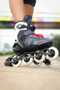 Detailed view of rollerblades worn outdoors in Mumbai, showcasing leisure and skill.