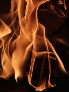 Artistic capture of vibrant flames in motion, creating an abstract visual.