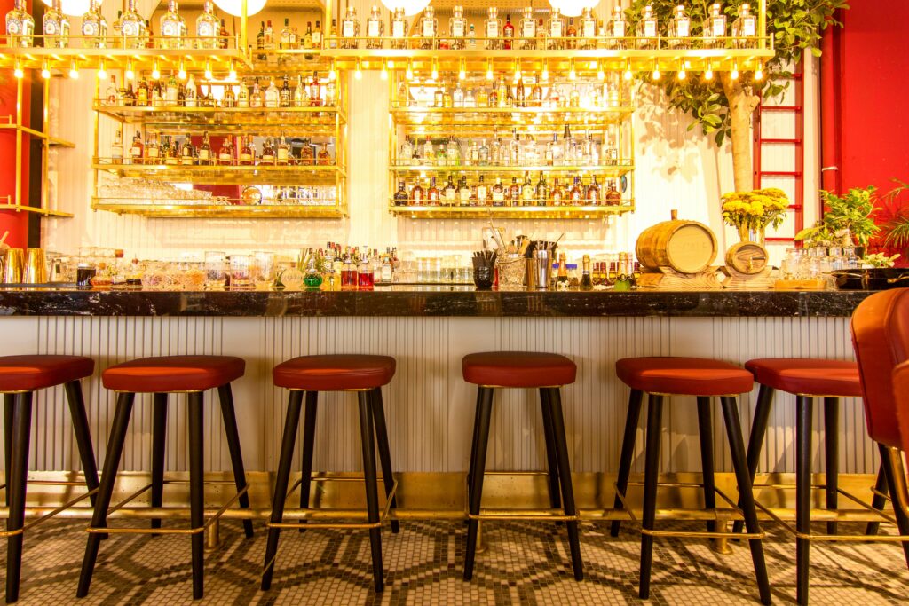 Sophisticated bar setup in Istanbul featuring sleek stools and a vibrant atmosphere.