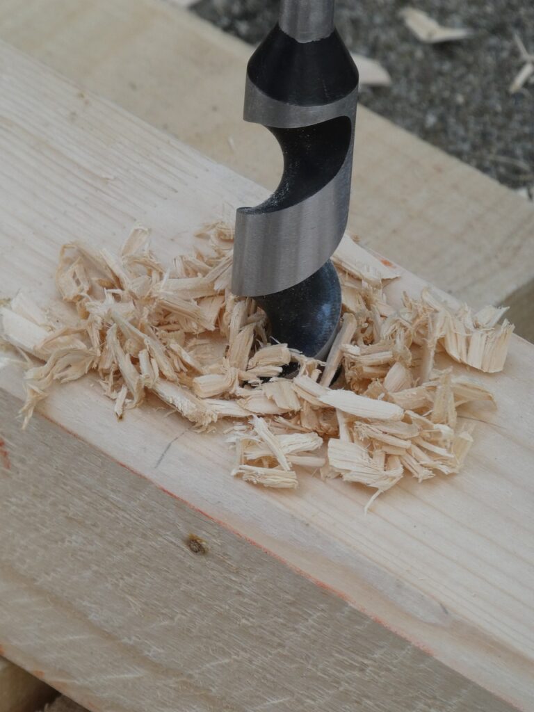 handwork, wood, drill, hand drill, chips, drill, drill, drill, drill, drill, hand drill, chips